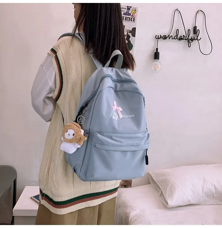 

College style ancient sense of small fresh and lovely girl bowknot student schoolbag versatile solid color backpack