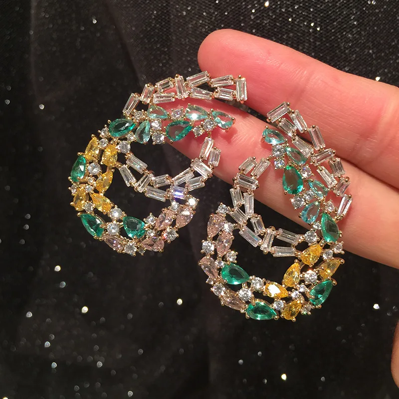 

Flower earrings women's micro-inlaid zircon luxury exaggerated super flash temperament elegant high-level spring earrings