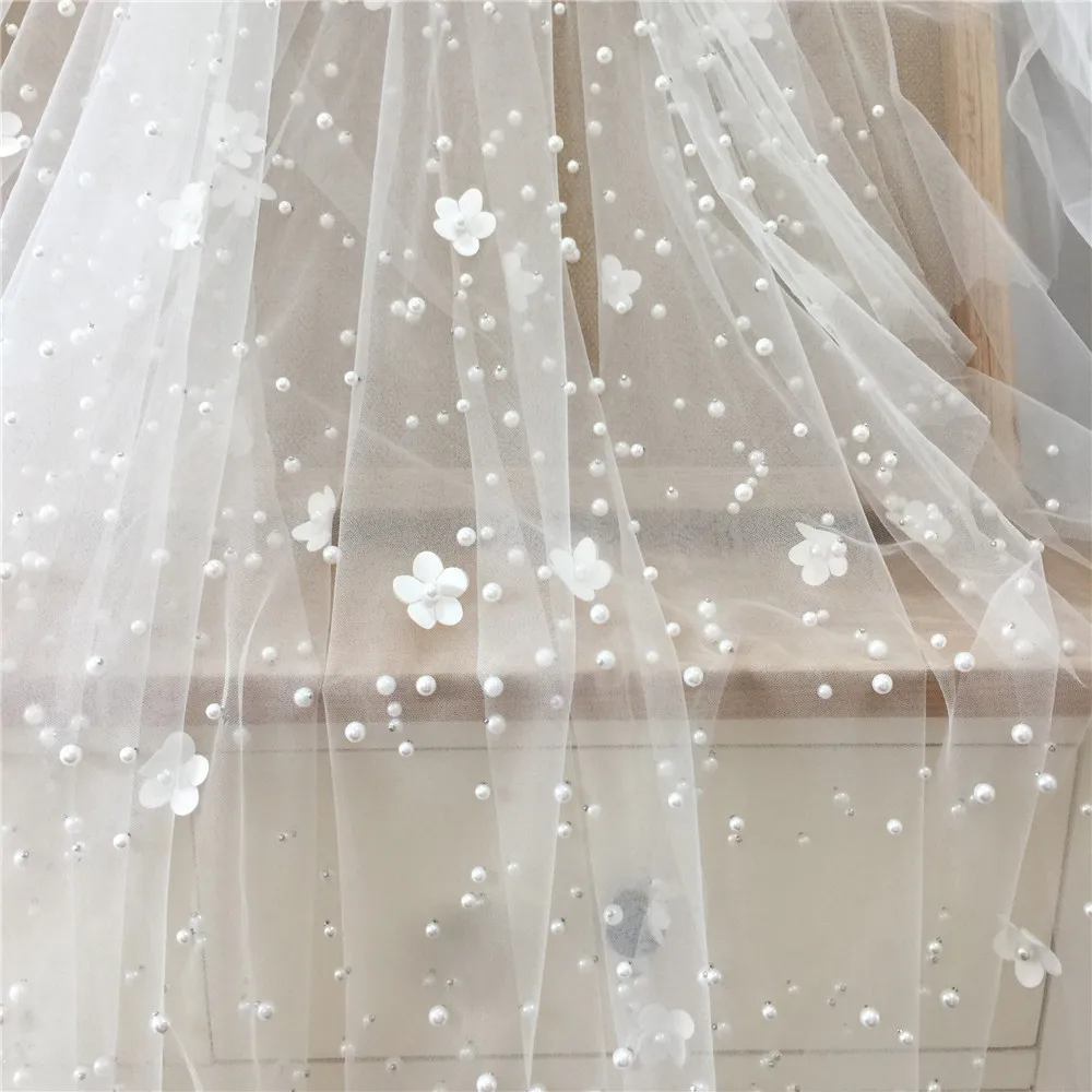 

Off white tulle mesh lace with pearls and petals, 1 Meter wedding veils, gowns lace material beads & 2d appliques nice!