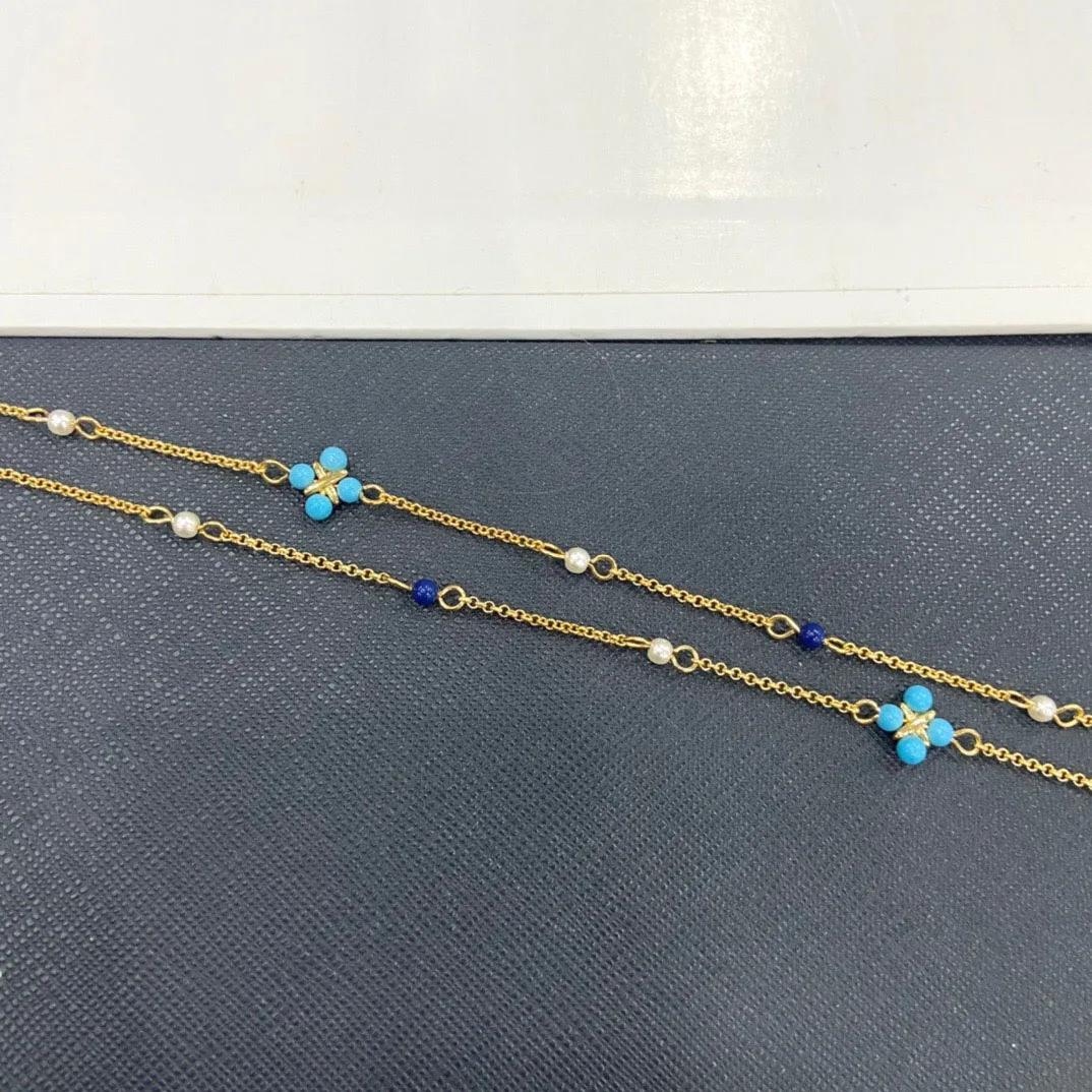 Женское ожерелье из серебра пробы с жемчугом и синим камнем | Украшения