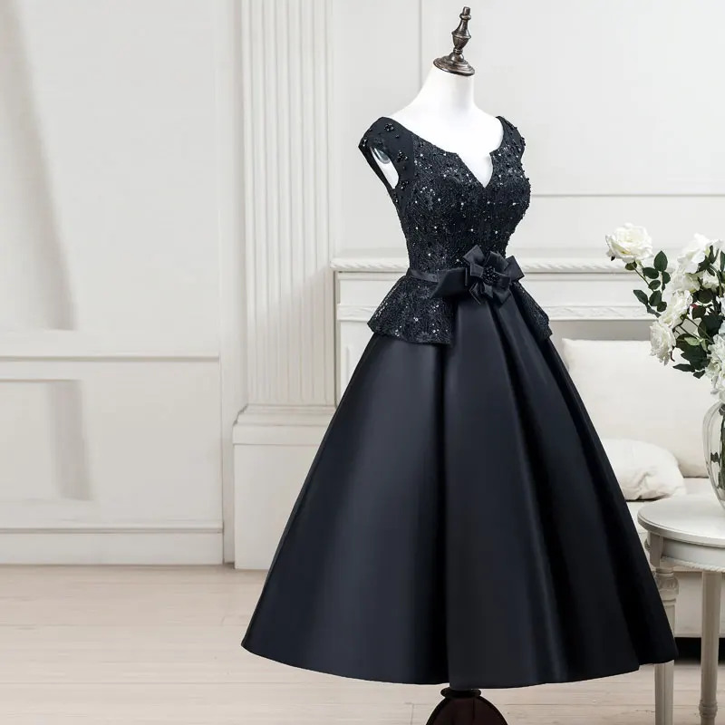 Черное вечернее платье Tanpell с V образным вырезом рукавами крылышками шнуровкой