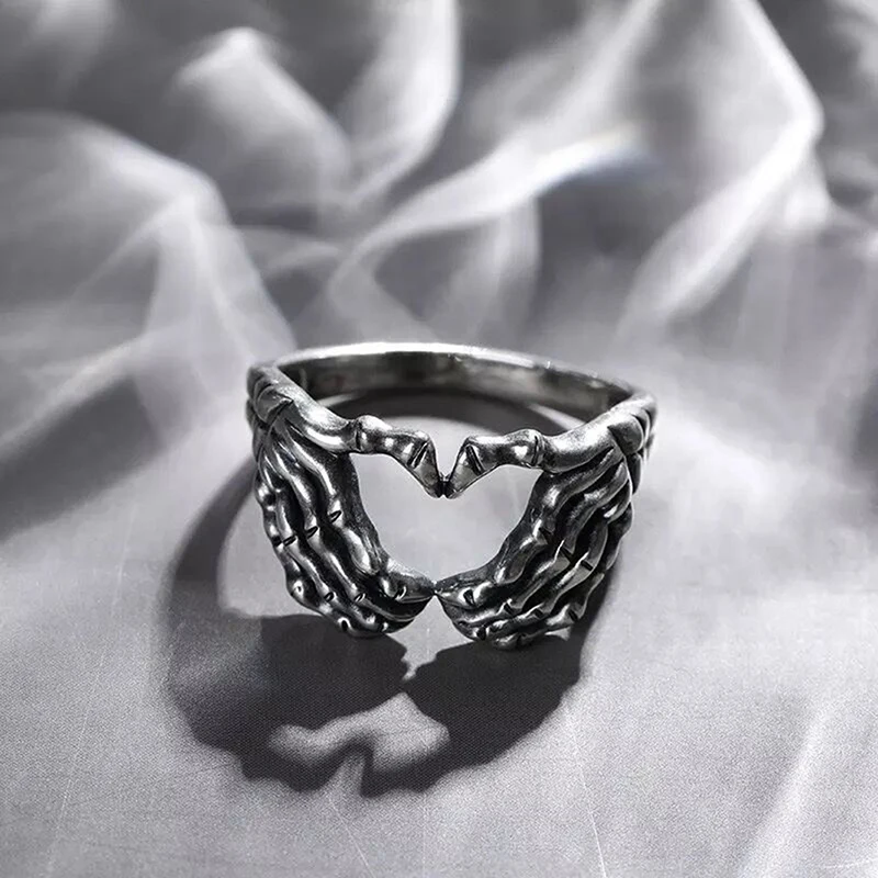 

Silver Plated Hand with Heart Rings for Men Punk Gothic Creative Skeleton Couple Ring Women Hip Hop Band Jewelry Charm Gift