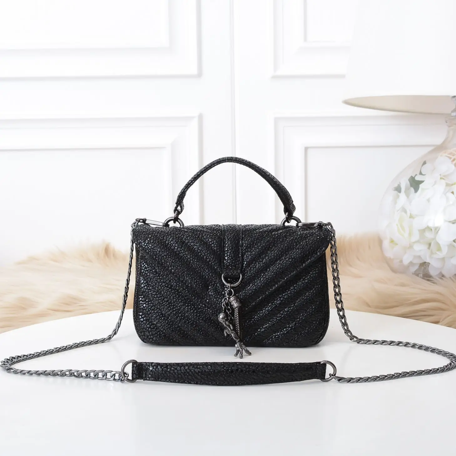 

Pearl caviar leather cross-body bag woman tassel head layer glossy leather pa