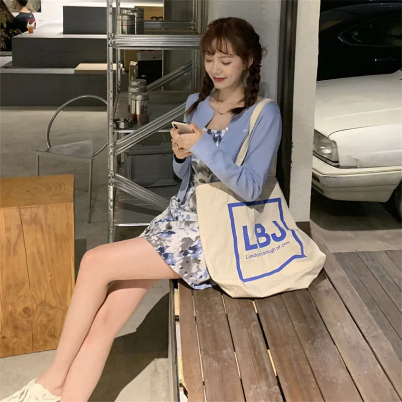 

2021 summer new large size women's clothing new ink printing sling dress knitted sunscreen cardigan two-piece suit