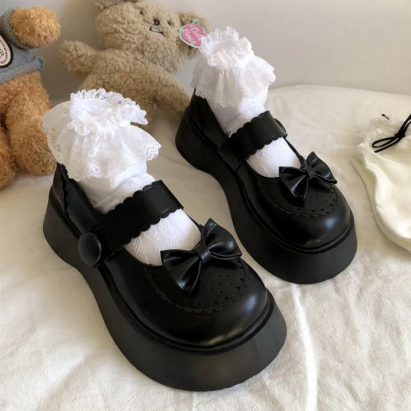 Женские лакированные туфли с бантом черные из лакированной кожи на платформе