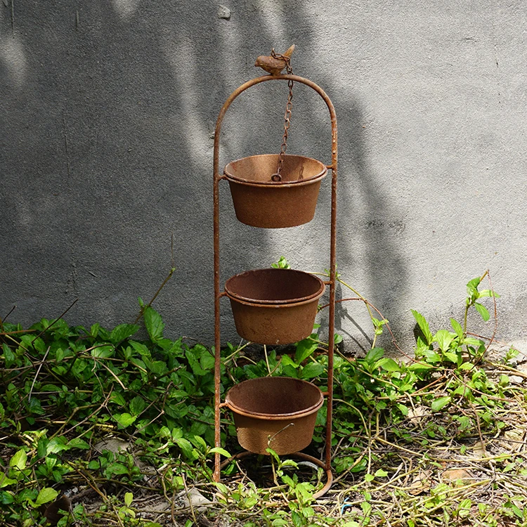 red pottery looking rustic vintage metal flower pot flower decoration