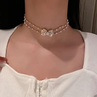 korean fashion personality double pearl necklace with diamond bowknot female temperament exquisite clavicle chain