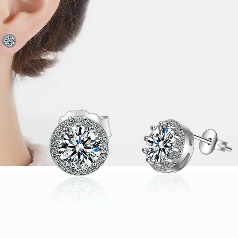 Женские серьги гвоздики серебряного цвета с круглыми кристаллами и фианитом