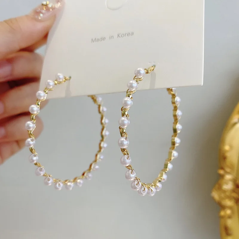 

2021 new fashion personality exaggerated big ring pearl earrings female fashion temperament retro s925 silver needle earrings