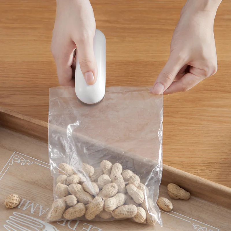 Мини полиэтиленовый пакет тепловые герметики бытовой портативный мешок клип