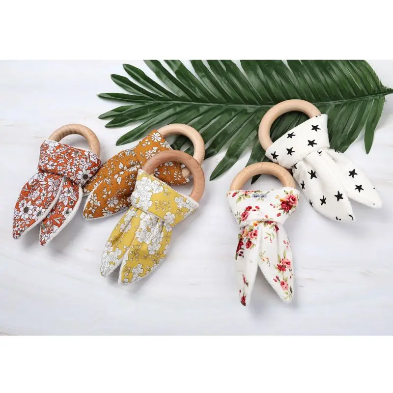 

Baby Teether Beech Wooden Ring Teething Rattles Chew Play Gym Montessori Toy