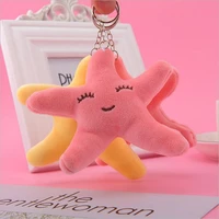 1pcs cartoon smiley starfish plush toys for christmas gifts doll stuffed pendant school bag ornament doll keychain small gift