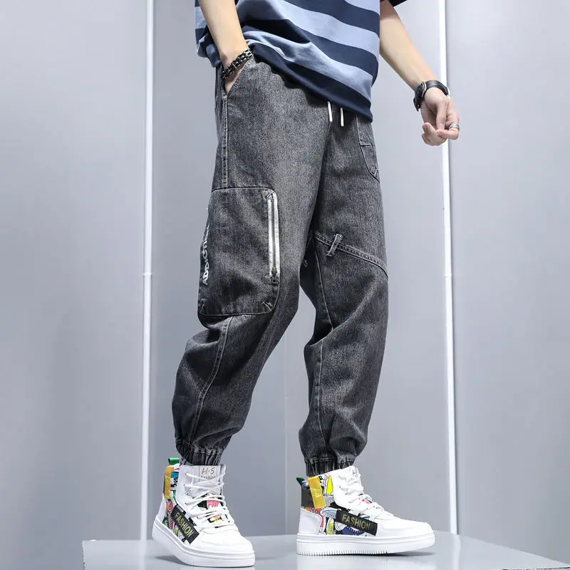 

Summer popular logo splice loose wash white new light jeans men's leisure Harlem leg strap nine cent pants