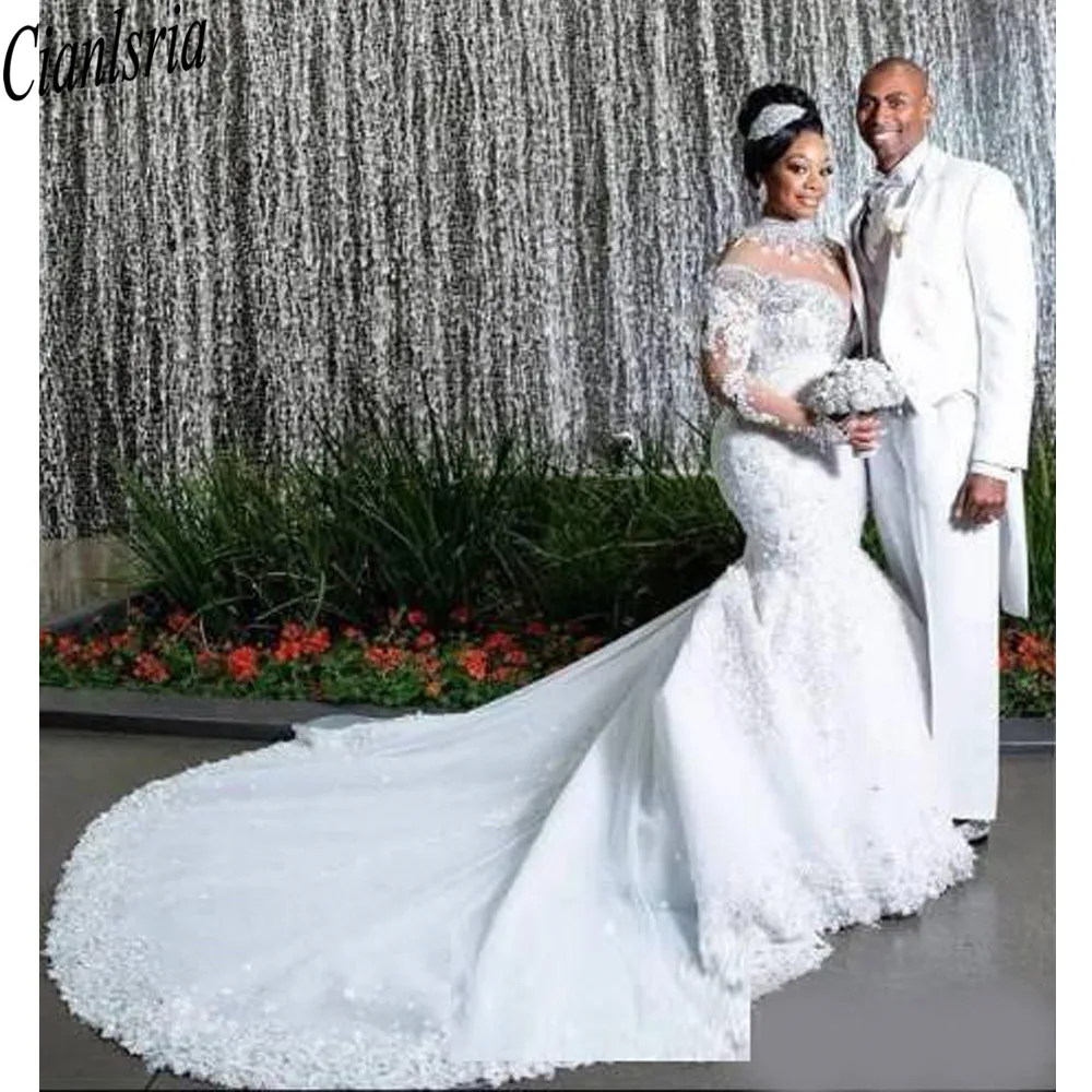 

Luxury 2021 South African Mermaid Wedding Dresses Lace Crystals Beading Long Sleeves Bridal Gown High Neck Sheer Neck Plus Size