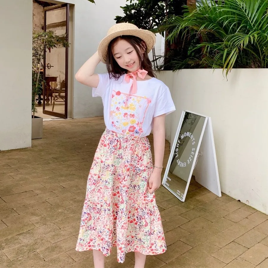 

Женская летняя одежда из 2 предметов, футболка с коротким рукавом и милым цветочным принтом + юбка средней длины с цветочным принтом