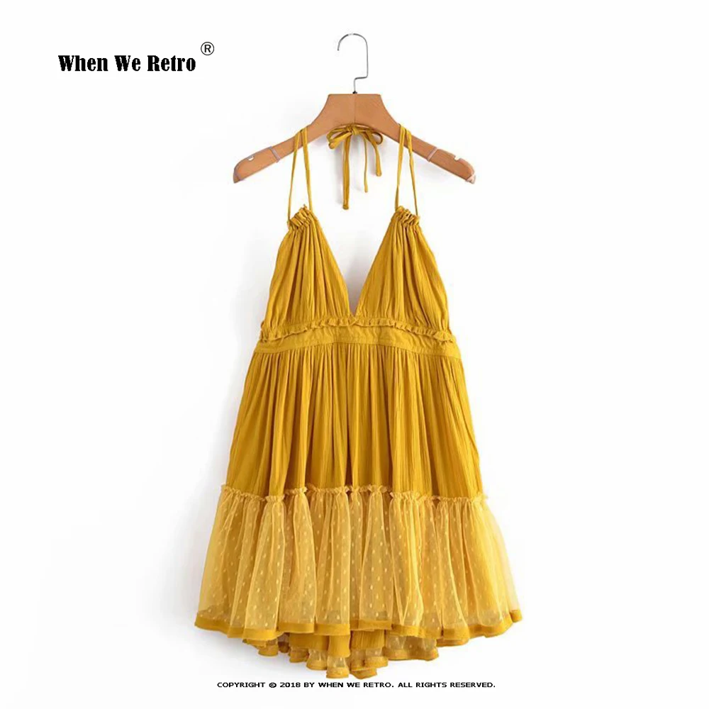 

Женское платье с открытой спиной и V-образным вырезом