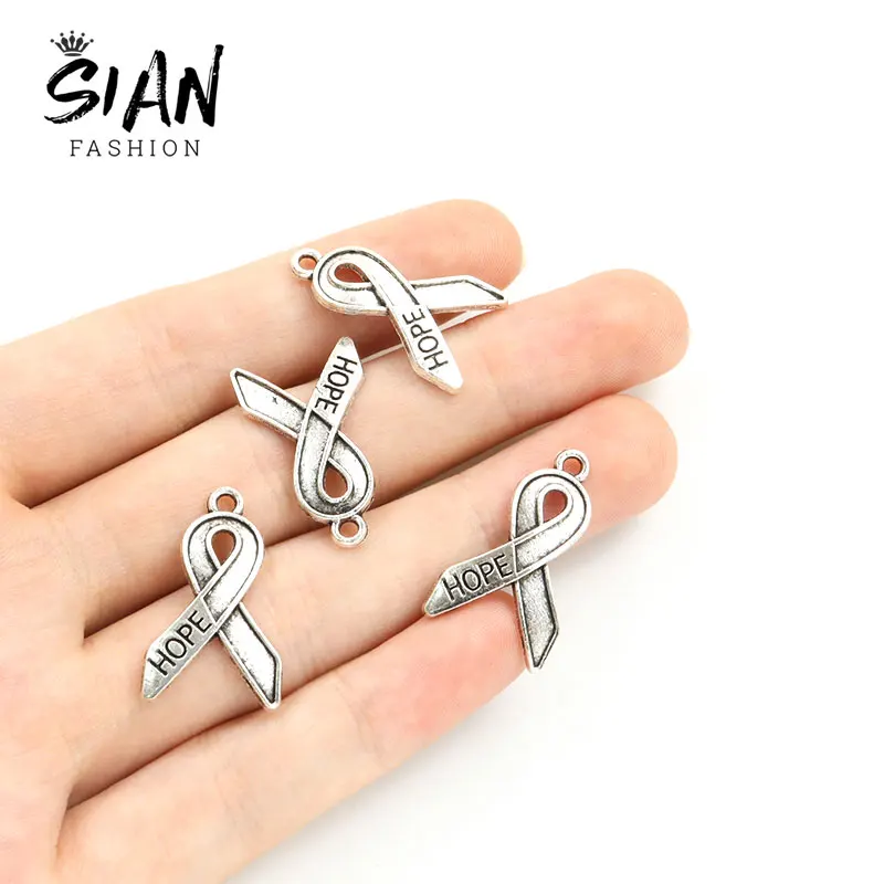 

20pcs 24x15mm Breast Cancer Awareness Ribbon Charms Silver Plated Hope Alloy Metal Pendants for DIY Jewelry Making Bracelet Gift