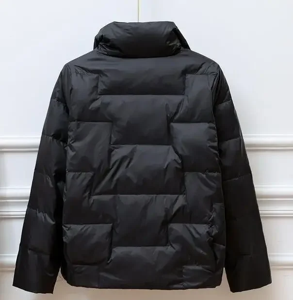 Стильный женский черно-белый зимний теплый однобортный пуховик с лацканами