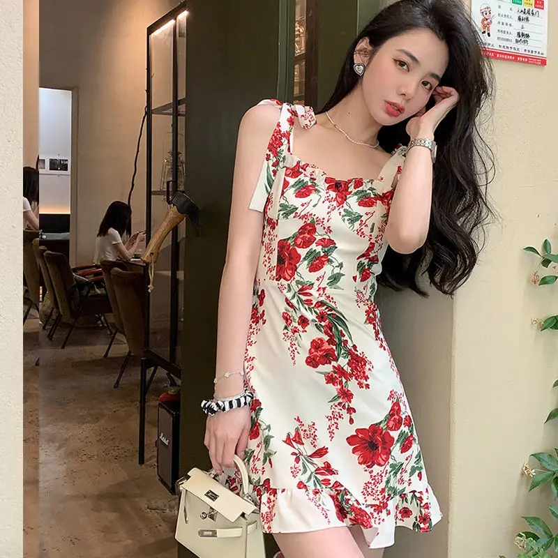 

2022 Summer new girl's print suspender skirt bow tie skirt