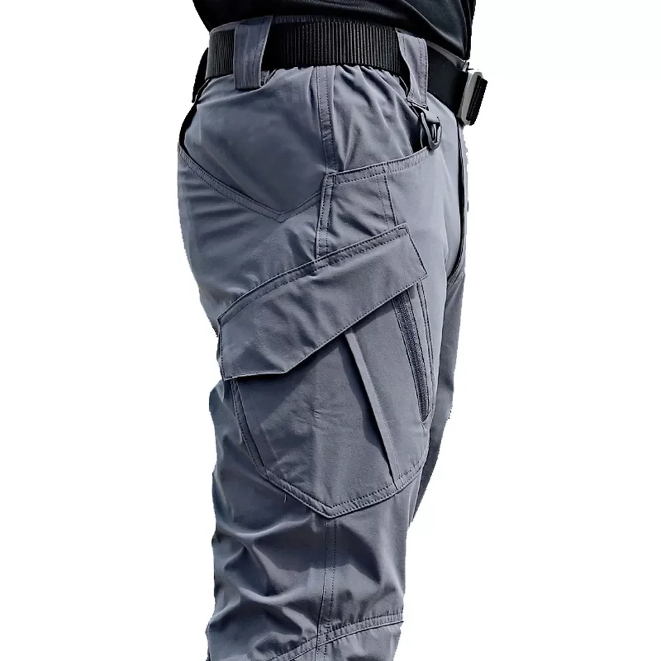 

2023New Mens Tactical Pants Multiple Pocket Elasticity Military Urban Commuter Tacitcal Trousers Men Slim Fat Cargo Pant 5XL