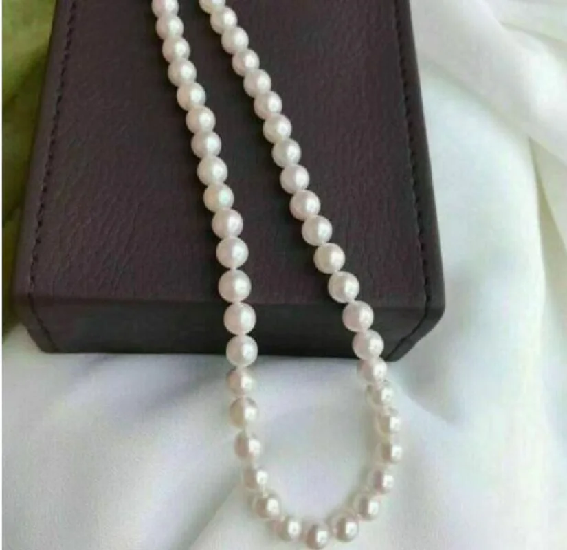 

Top AAA Japan Akoya 7-8mm White Pearl Necklace 18 "14K Gold Buckle