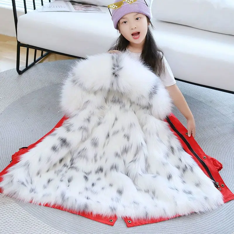 The new children's school overcomes the long Parker coat in the fur coat with imitation fox fur collar for girls and boys in win