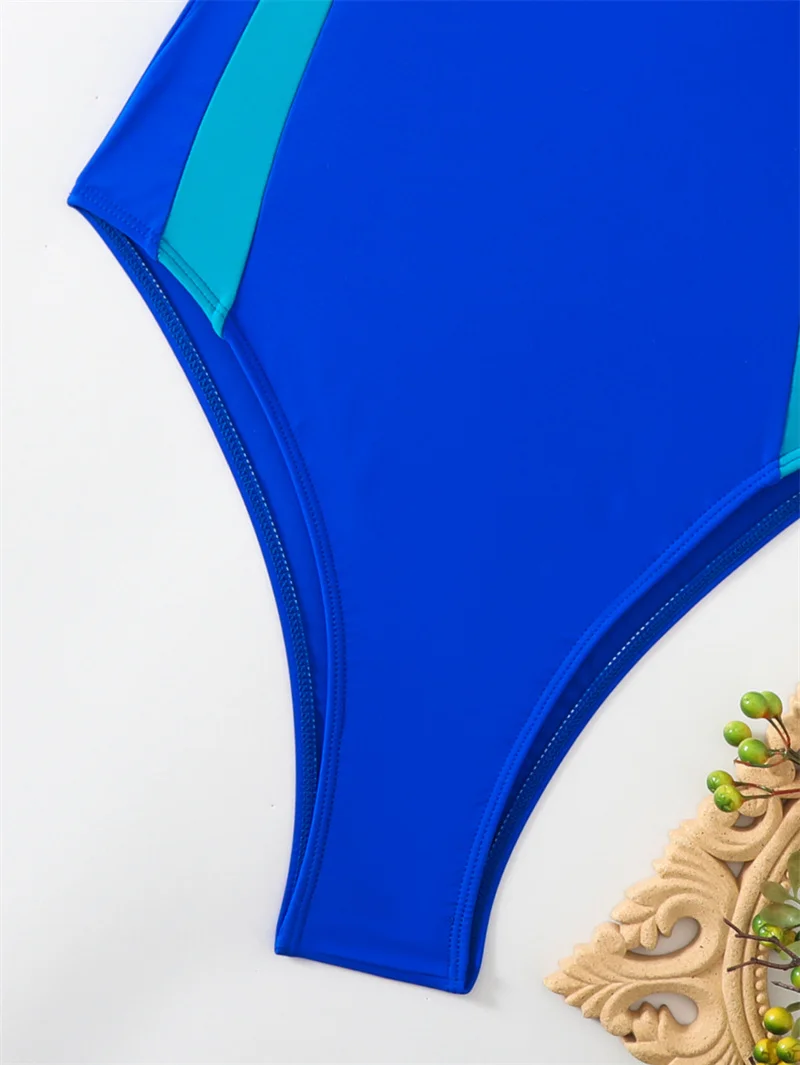 Купальник сплошной с коротким рукавом и открытой спиной 2024