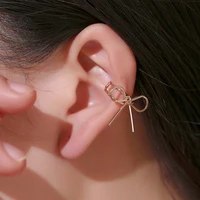 2022 new temperament girl bow ear bone clip korean version simple sweet and cute no ear hole personality earring ear clip