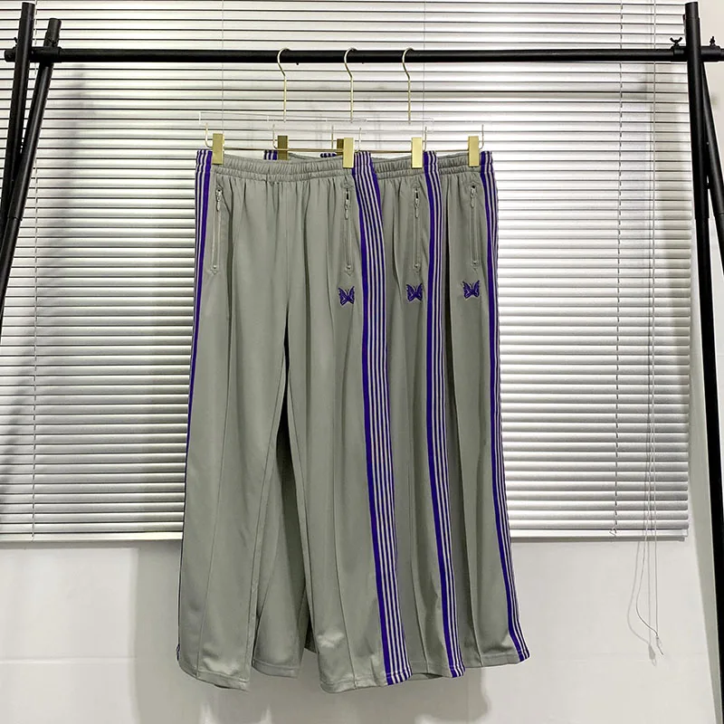 

Мужские спортивные штаны с вышивкой в виде бабочек