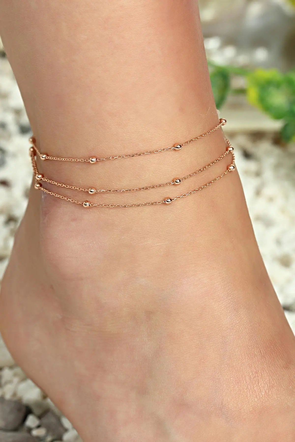 

Женский серебряный браслет на ногу с тремя блестками Dsalk6021