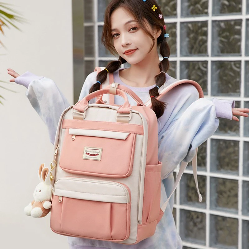 

2022 new junior high school schoolbag female university simple and versatile solid color backpack female high-capacity Backpack