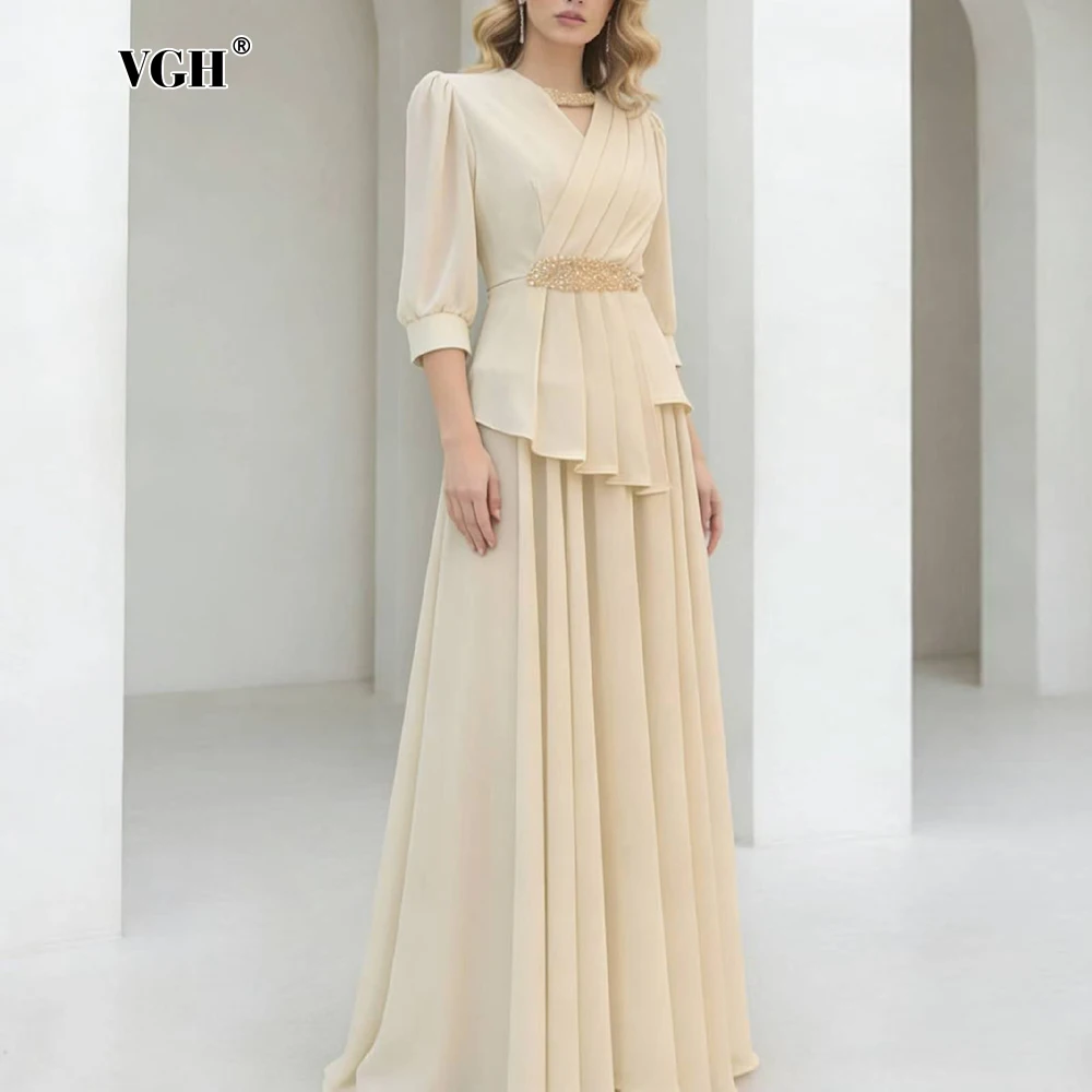 Фото Элегантный комплект VGH Galas Apricot из двух предметов для женщин: топ с V-образным вырезом и рукавом до локтя, юбка с бисерной отделкой на талии, струящийся костюм для гостей на свадьбу №1