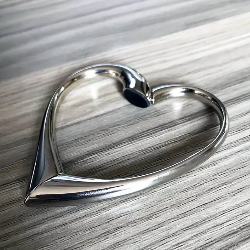 

Крючок для сумки серебристого цвета