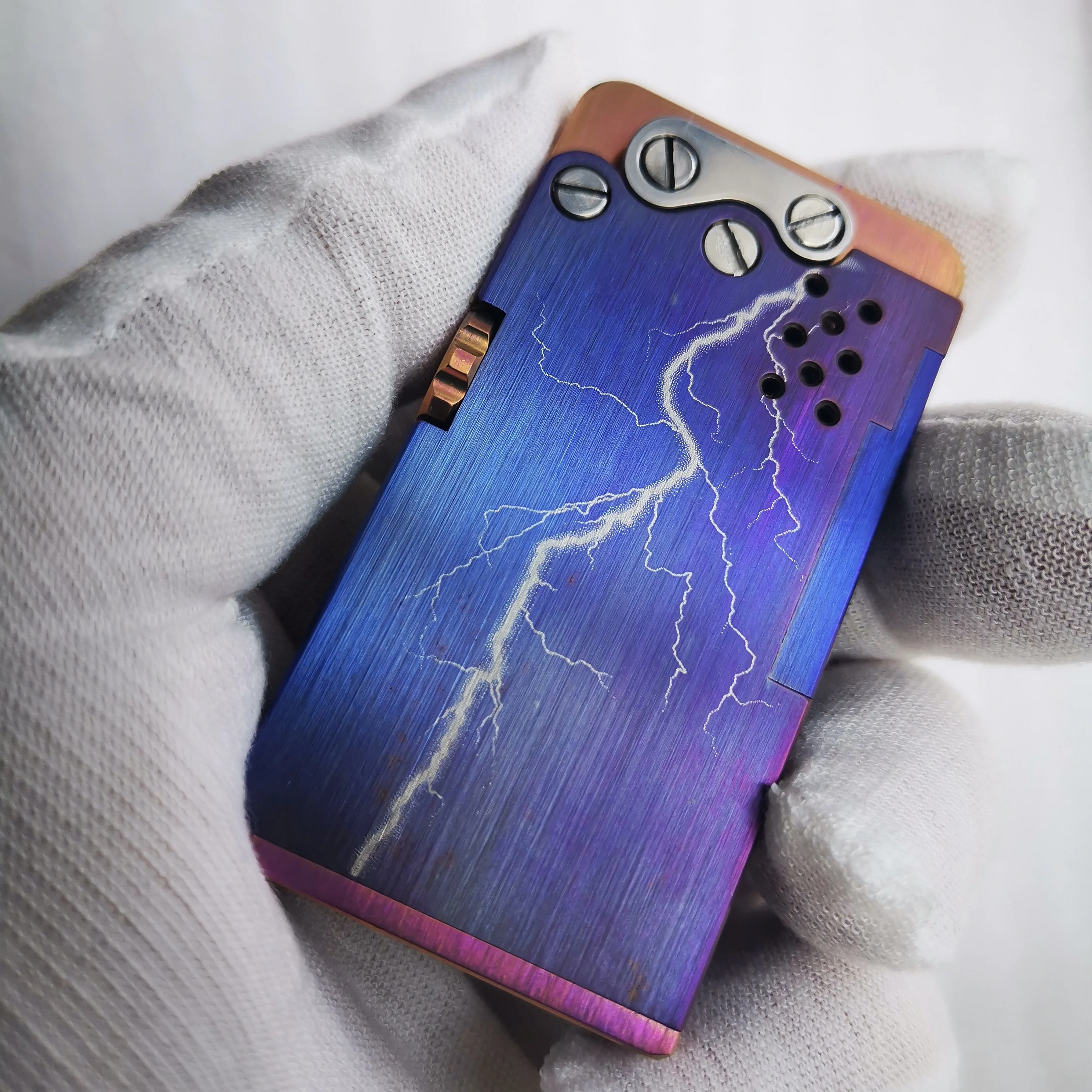 Handmade mechanical titanium automatic lighter. Handmade mechanical titanium automatic lighter
