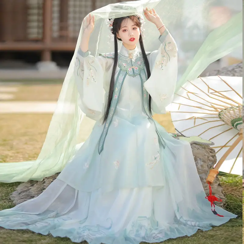 

Элегантное оригинальное платье династии Мин ханьфу со стоячим воротником плиссированная юбка с облачными плечами 4 шт. Женские китайские сказочные зеленые платья