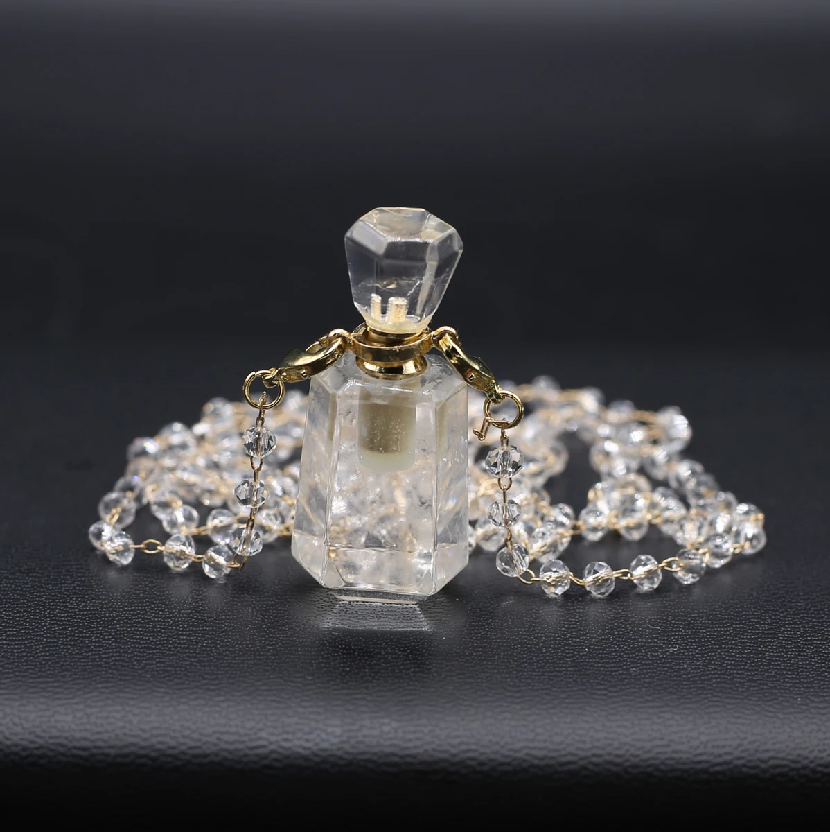 

Natural Semi-Precious Stone Clear Quartz Perfume Bottle Essential Oil Diffuser Necklace Crystal Decoration Wholesale