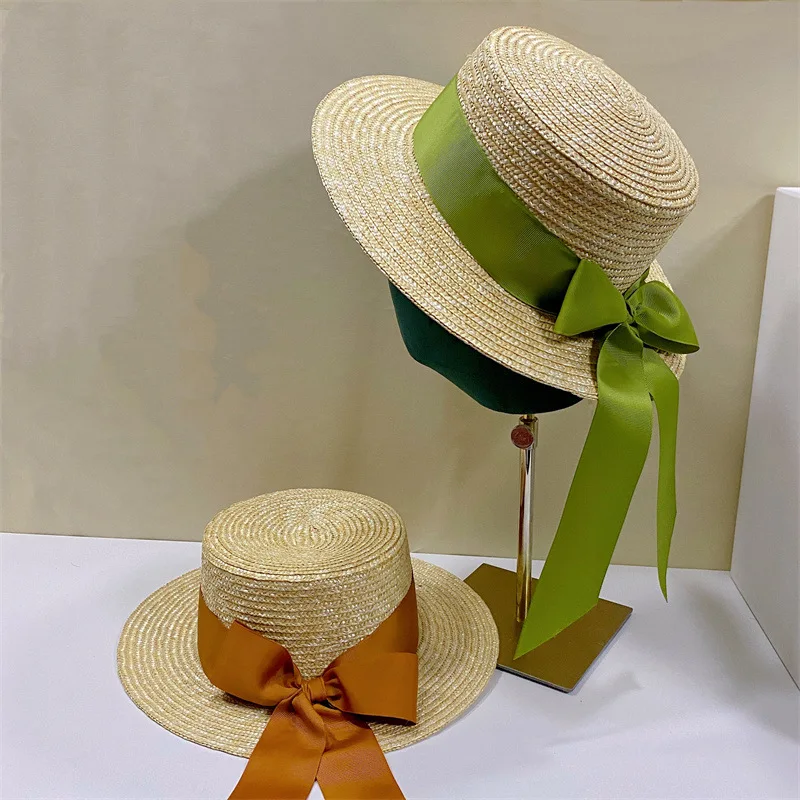 

202204-nu summer holiday handmade straw green ribbon bowknot leisure lady holiday beach fedroas cap women outdoor hat