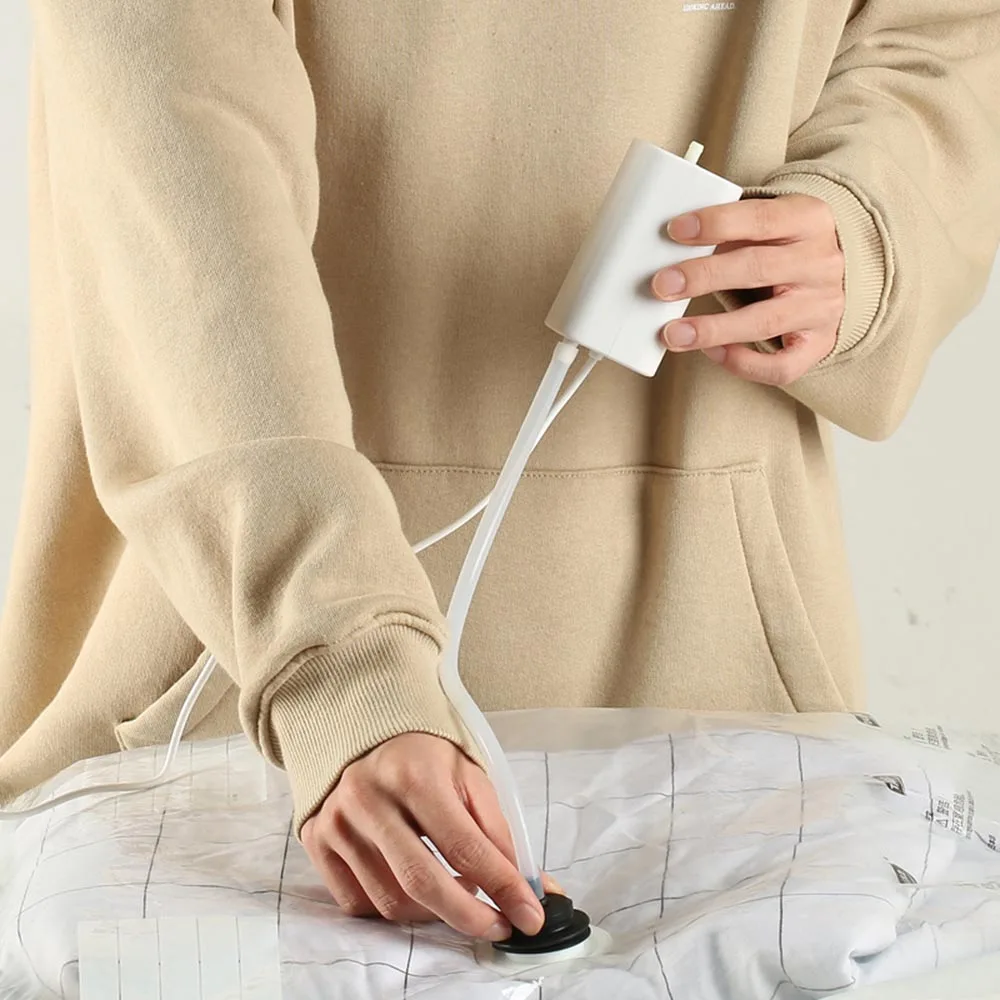 

Портативный вакуумный упаковщик с питанием от двигателя и USB