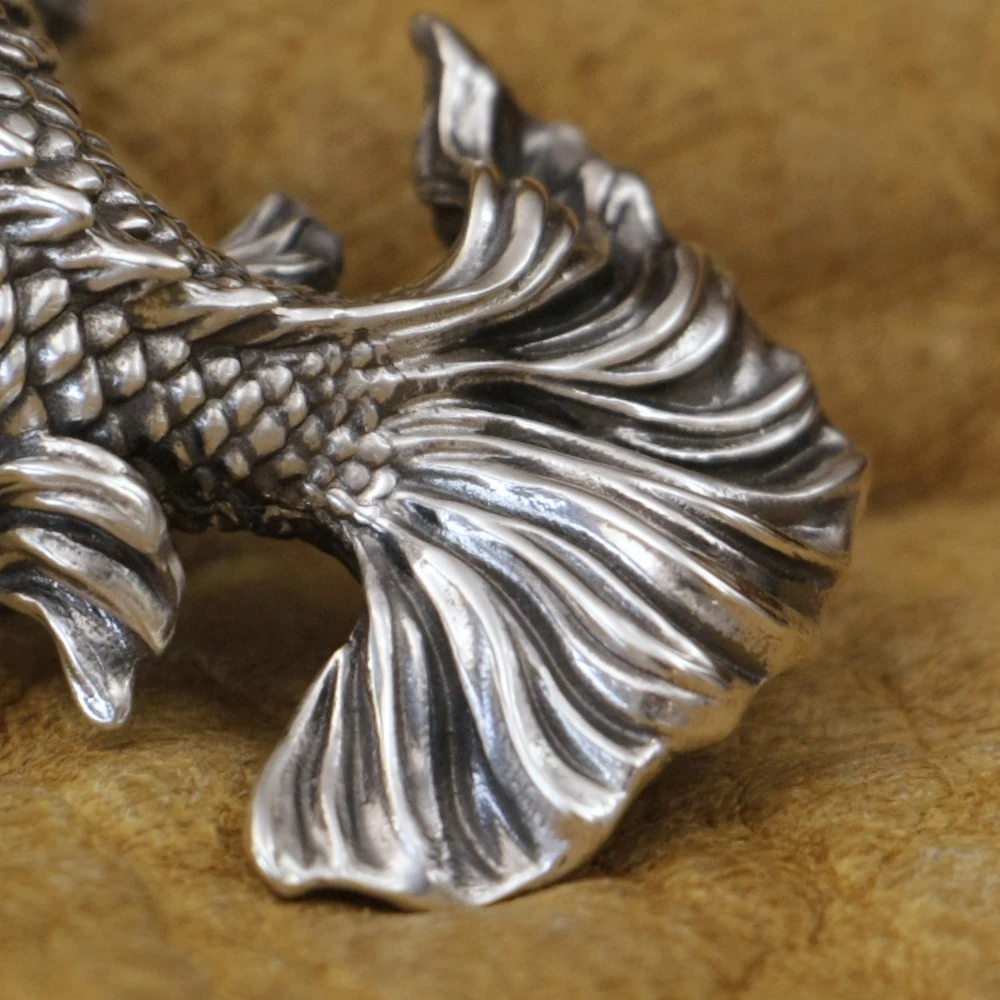 _ Серебряная подвеска в виде рыбки с изображением дракона что означает Улучшение