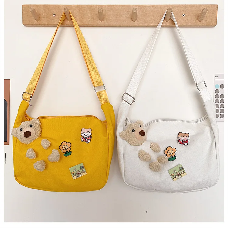 

Women Canvas Shoulder Bag Cute Bear Pendant Coth Handbag Large Shopping Bag Solid Color Shopper Tote Bag Lovely Crossbody Bag