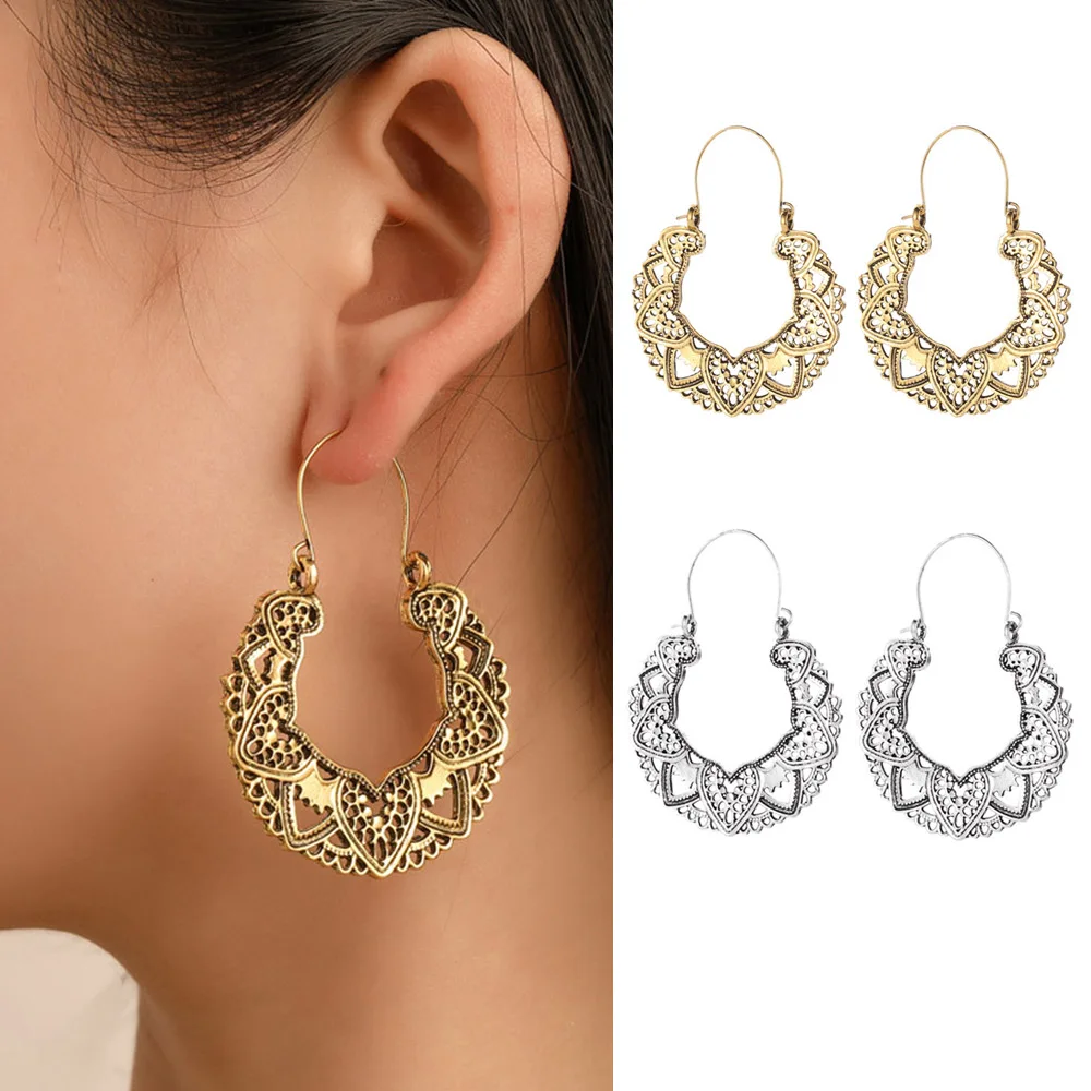 

2022 Retro Exaggerated Hollow Pattern Totem Earrings Fashion Petal Geometric Heart Metal Roll Earrings For Women Jewelry