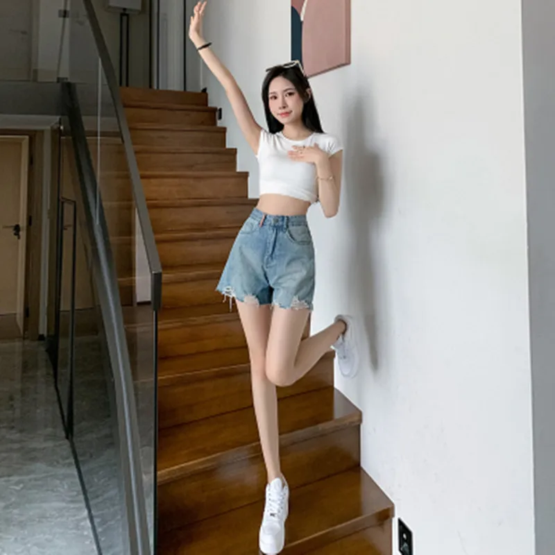 BULOCHOVA New Fashion Summer Blue High Waist Loose Hole Denim Shorts Women Wide Leg Hot Short Pants Jeans Female Large Size 2023