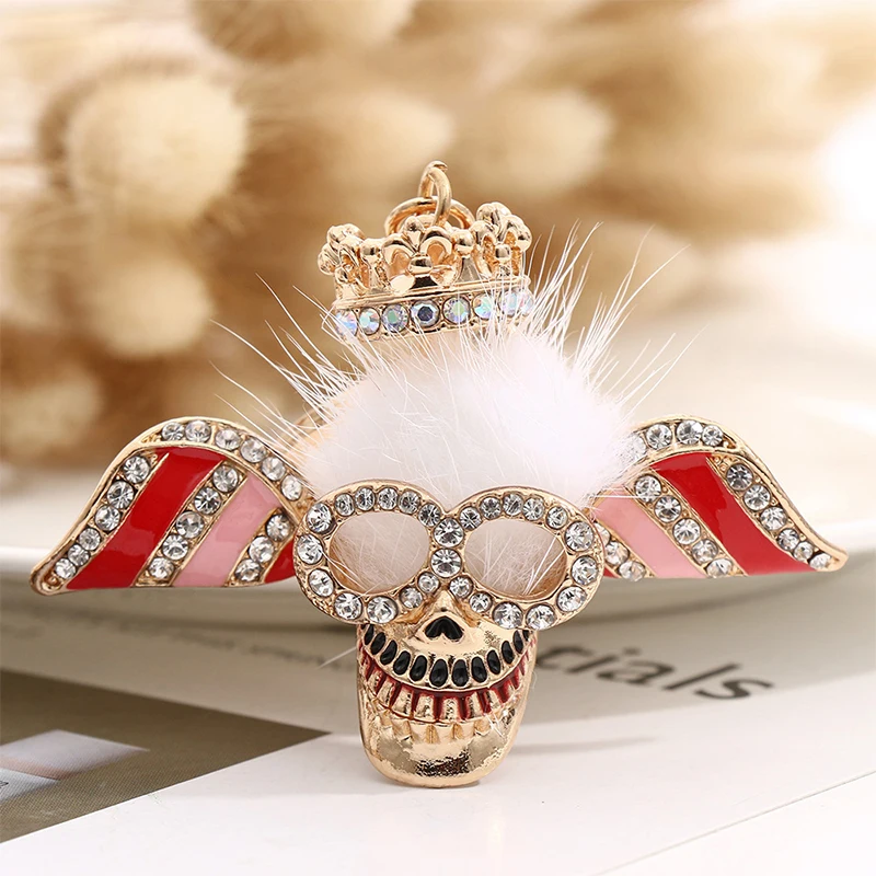 

Fashion Diamond Hair Ball Skull Keychain Creative Metal Hollow Rhinestone Crown Keyring Car Bag Pendant Jewelry Gift Accessories