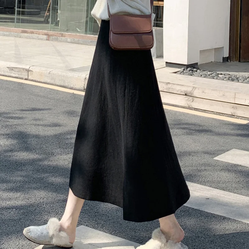 

Женская трикотажная юбка, универсальная юбка средней длины с завышенной талией, трапециевидного силуэта, приталенная юбка на осень и зиму