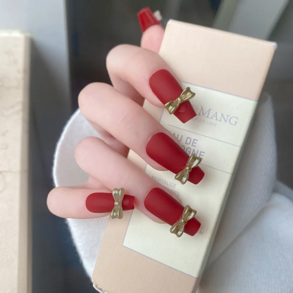 

Foreign Trade Hot Selling Nail Patch Wear Nail Coffin Nail Temperament Ins Nail Wine Red Gold Bow Nail Patch