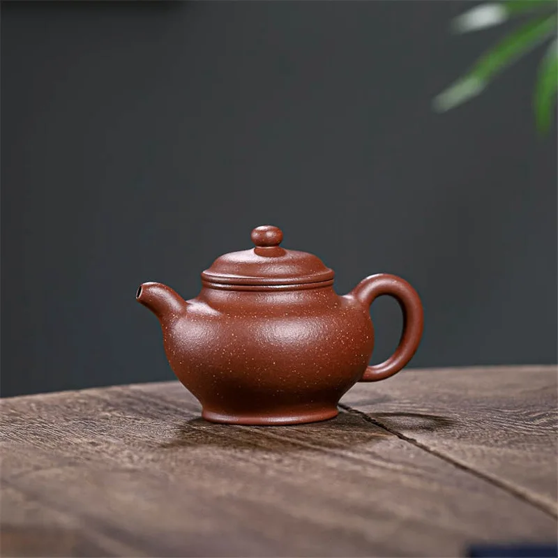 

Yixing Purple Clay Pot Descending Slope Mud Pieces150cc Chaoshan Simple Practical Kung Fu Tea Set Small Capacity Teapot