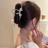 the new super fairy temperament pearls lily of the valley tassel shark clip hair claw clips for women headwear claw clip