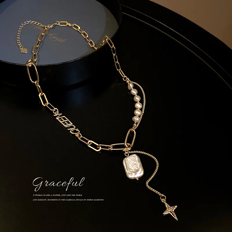 

Korean version of fashion personality freshwater pearl four-pointed star necklace female ins tide temperament high-end jewelry