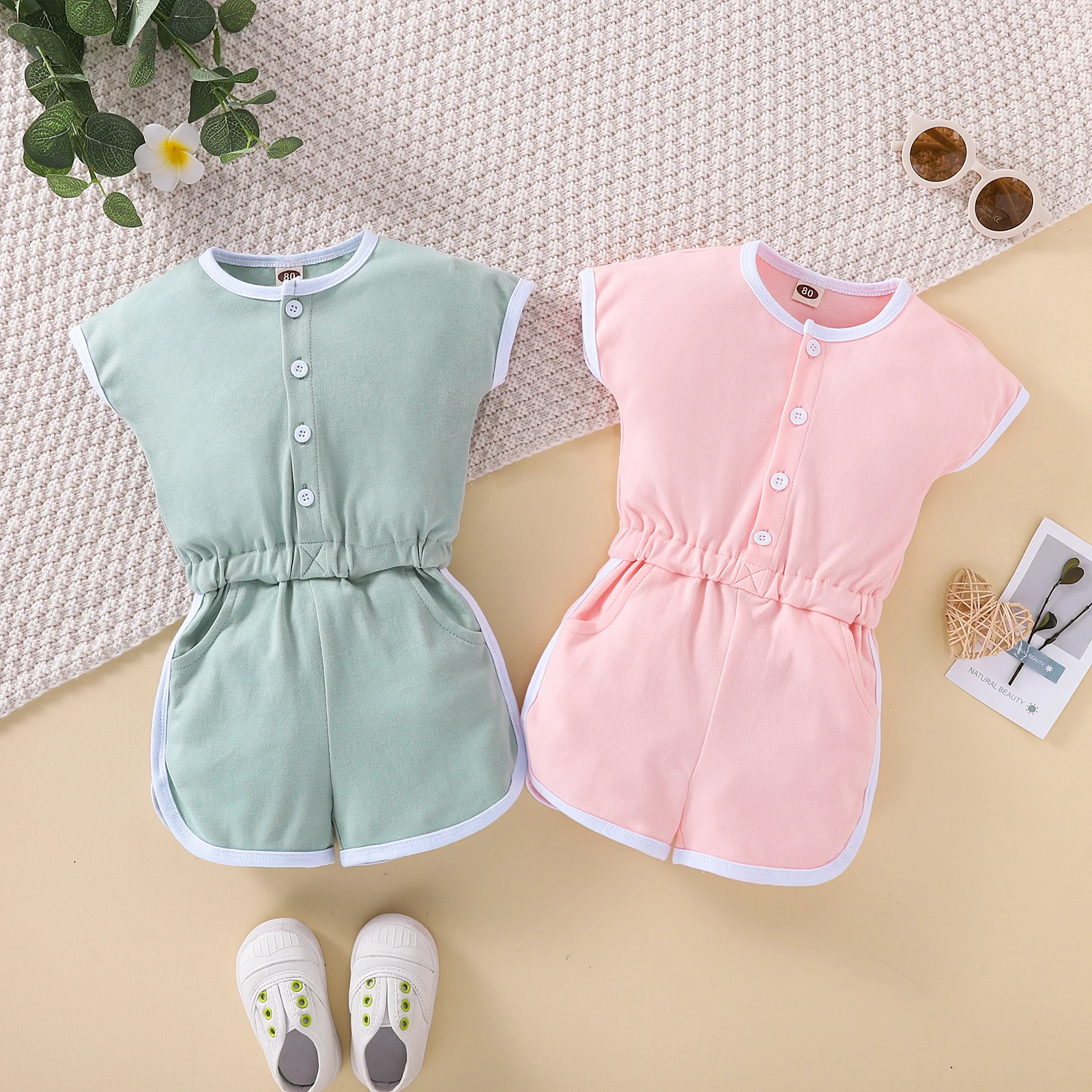

2022-02-08 Lioraitiin 0-4Years Toddler Baby Girl Summer Romper Short Sleeve Solid O-Neck Jumpsuit 2Colors