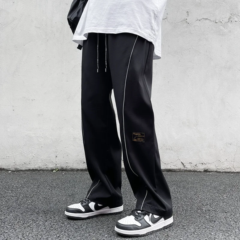

Черные спортивные брюки, мужские Модные повседневные брюки с широкими штанинами, Мужская Уличная одежда, свободные прямые брюки в стиле хип...